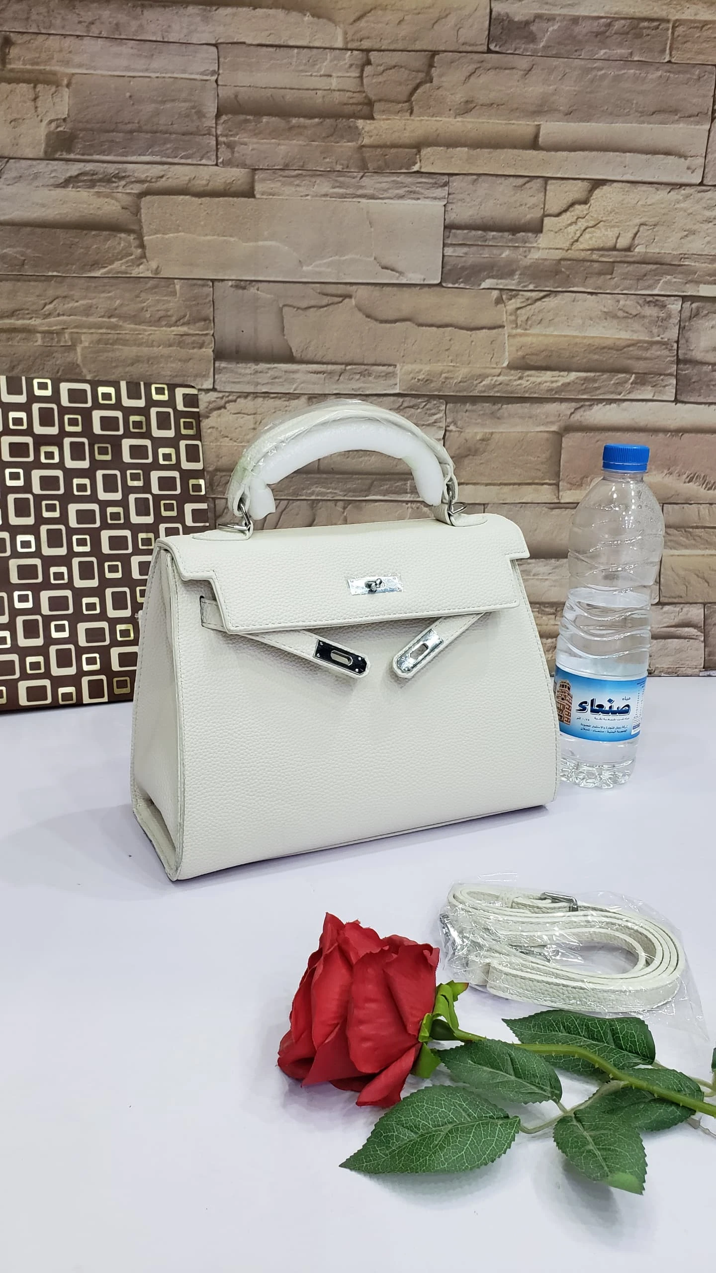 حقيبة هرمز جلد بني – لمسة فخامة